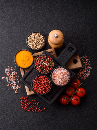 Indian spices, pepper, salt, turmeric, ingredients for cooking. Spices pepper, salt, and turmeric as a food background for your designの写真素材