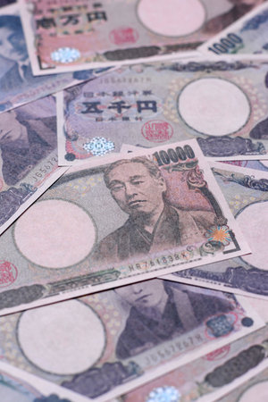Japan, Japanese yen paper banknotes, money for business, financial transactions, and settlements. Japanese yen as a financial background for your designの写真素材