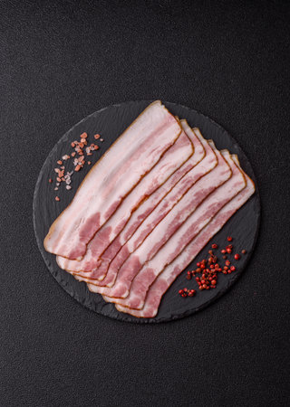Raw smoked bacon slices as a food background for your design