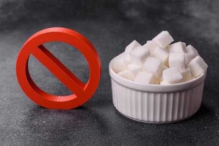 The sugar ban sign as a concept to stop the problem of diabetes and obesity, a call to diet. The sugar ban sign as a background for your designの写真素材
