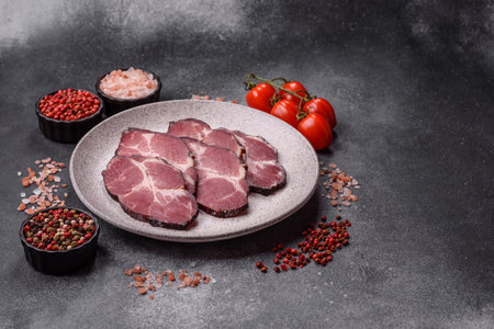 Meat, smoked ham, or pork sausage sliced for breakfast sandwiches. Sliced ham as a food background for your designの写真素材