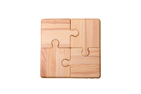 A wooden empty puzzle piece for a sign or business concept. A wooden empty puzzle as a conceptual...