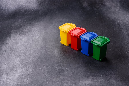 Bins for trash or garbage, a conceptual background for selective and waste disposal. Bins for trash or waste as a background for your designの写真素材