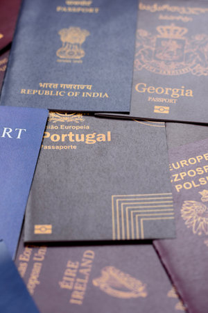 Passports of citizens of different countries of the world, background consisting of passports of several countriesの写真素材