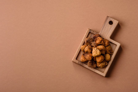 Dried figs are a sweet, healthy fruit for vegans and vegetarians. Dried fig as a food background for your designの写真素材