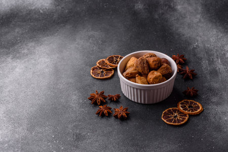 Dried figs are a sweet, healthy fruit. Dried fig as a food background for your designの写真素材