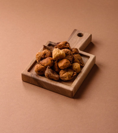 Dried figs are a sweet, healthy fruit for vegans and vegetarians. Dried fig as a food background for your designの写真素材