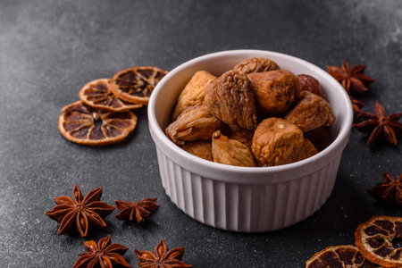 Dried figs are a sweet, healthy fruit. Dried fig as a background for your designの写真素材
