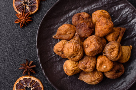 Dried figs are a sweet, healthy fruit. Dried fig as a food background for your designの写真素材