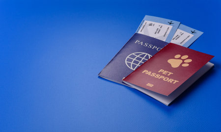 A pet passport is a document with vaccination and travel information for a cat, dog, or other animal. A pet passport as a background for your design.の写真素材