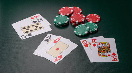 Casino, cards and chips on a colored background, poker and blackjack, gambling with bets. Cards and...