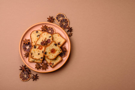 Fruit cake, a pastry, and dessert with cherries, plums, and raisins for a festive table. Fruit pie as a food background for your design.の写真素材