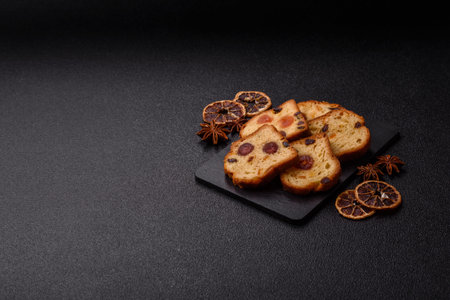 Fruit cake, a pastry, and dessert with cherries, plums, and raisins for a festive Christmas table. Fruit pie as a food background for your design.の写真素材