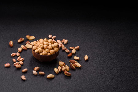 Whole peeled hazelnuts, as an ingredient for healthy food. Hazelnuts as a background for your design