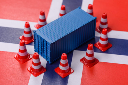 The cargo container ban on the Norwegian flag as a conceptual backdrop for the export and logistics of goods. The cargo container embargo on the Norway flag as a backdrop for your designの写真素材