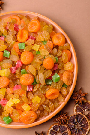 Dried apricots, raisins, and candied fruits as ingredients for baked goods and sweets. Dried fruits...