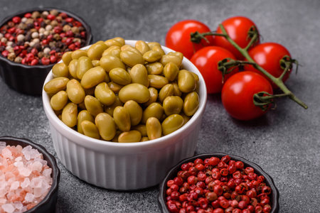 Canned green edamame beans as a healthy vegan ingredient. Edamame beans as a food background for...