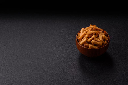 Croutons or crackers made from rye bread with garlic, salt, and spices, a salad ingredient. Croutons...