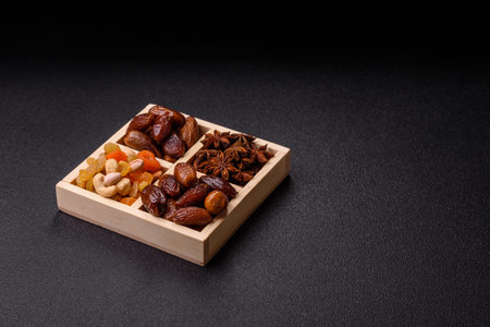 Dried dates on a ceramic plate. Dried dates as a food background for your design