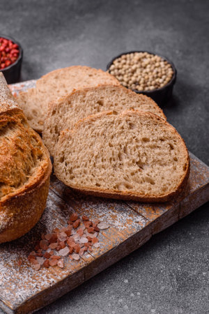 A loaf of homemade whole grain rye bread for the dinner table. A loaf of rye bread as a food...