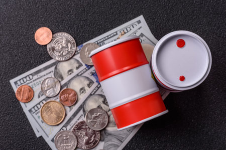 A barrel of oil against a backdrop of dollars as a concept for the global oil crisis and rising prices. A barrel of oil and dollars as a background for your designの写真素材