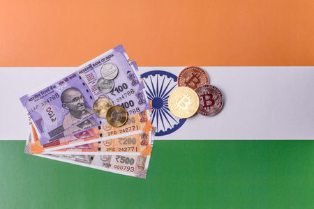 A conceptual financial background featuring Bitcoin against the Indian currency, the Rupee. Bitcoin...