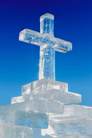 Ice cross on a blue sky background.の写真素材