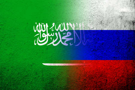 National flag of Russian Federation with The Kingdom of Saudi Arabia National flag. grunge backgroundの写真素材