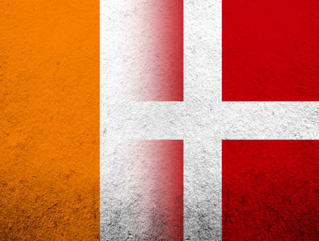 the Kingdom of Denmark National flag with Ivory Coast National flag. grunge backgroundの写真素材