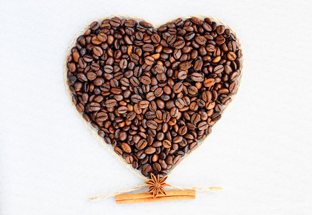 Coffee beans in the shape of a heart. Background from coffee Valentine's Day.