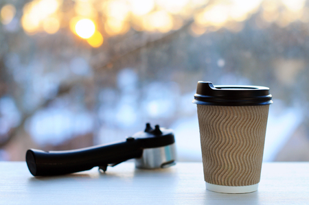 Cup with coffee on background of dawn. Cup of coffee.の写真素材