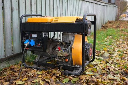 Using a generator on the street. power supply problems and their solutions.の写真素材