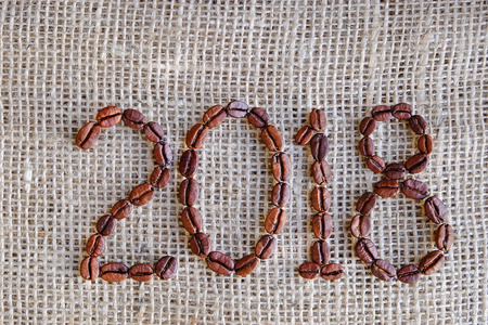 New Year Background of coffee beans. 2018 year.