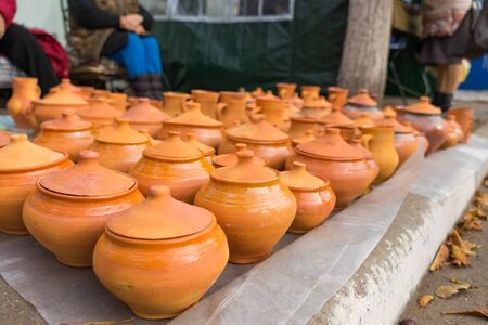 Beautiful handmade clay pots sold at the autumn fair.の写真素材