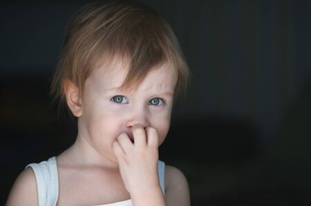 Sad child portrait after an argument with his parents.