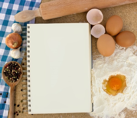 
Blank cookbook with basic ingredients for bakingの写真素材