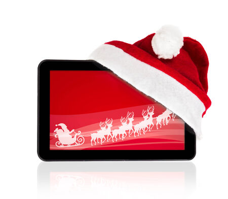 tablet touch pad computer gadget with Santa Claus on  red screenの写真素材