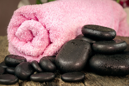 Close up of spa massage stone with towelの写真素材