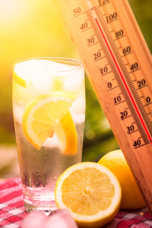 high temperature on thermometer,  hot dayの写真素材
