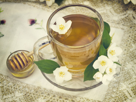 Vintage teacup on crochet tableclothの写真素材