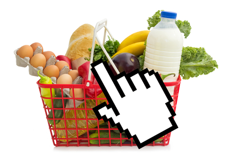 Shopping basket full of grocery, concept of online shoppingの写真素材