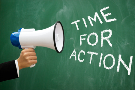 Megaphone with green blackboard with written words: Time for actionの写真素材
