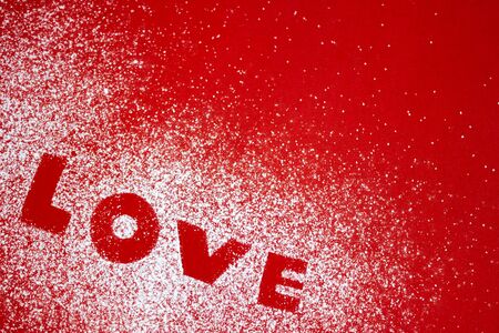 Word LOVE written in icing sugarの写真素材