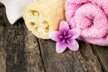Soap in the shape of a flower on a wooden surfaceの写真素材