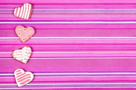 Heart shaped cookies baked Valentine's Day on the tableの写真素材