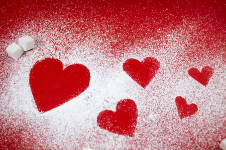 sugar hearts on red background Valentine's day wallpaperの写真素材