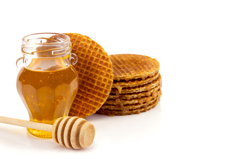 Fresh honey with biscuits of honeyの写真素材