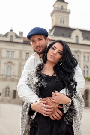 Young couple hugged together in the cityの写真素材