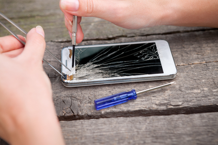 Service and repair service for smartphone with broken glassの写真素材