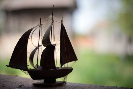Old wooden and dusty boat modelの写真素材